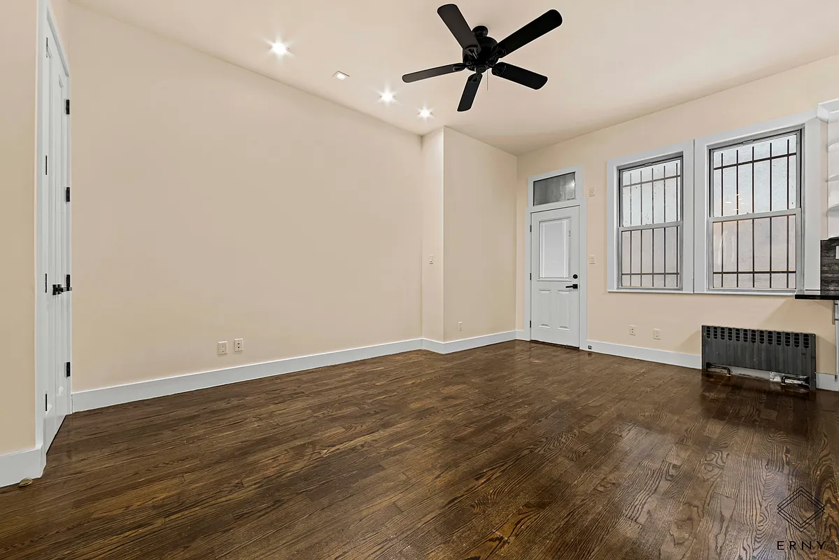 Wide view of the finished living area and hardwood flooring at 200 Lawrence Avenue Apartment 1