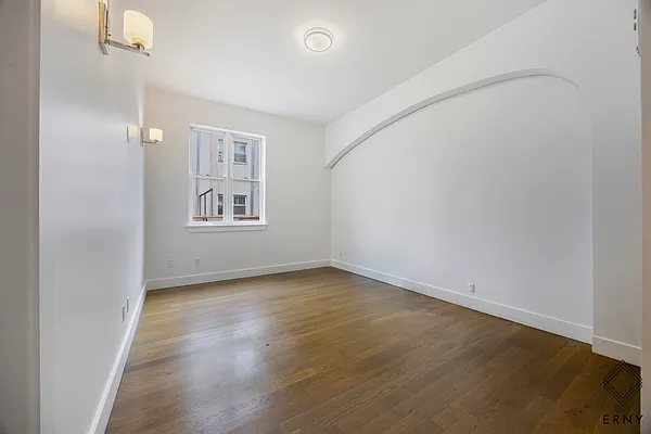 Finished bedroom with hardwood flooring at 65 Whipple Street Apartment 2R
